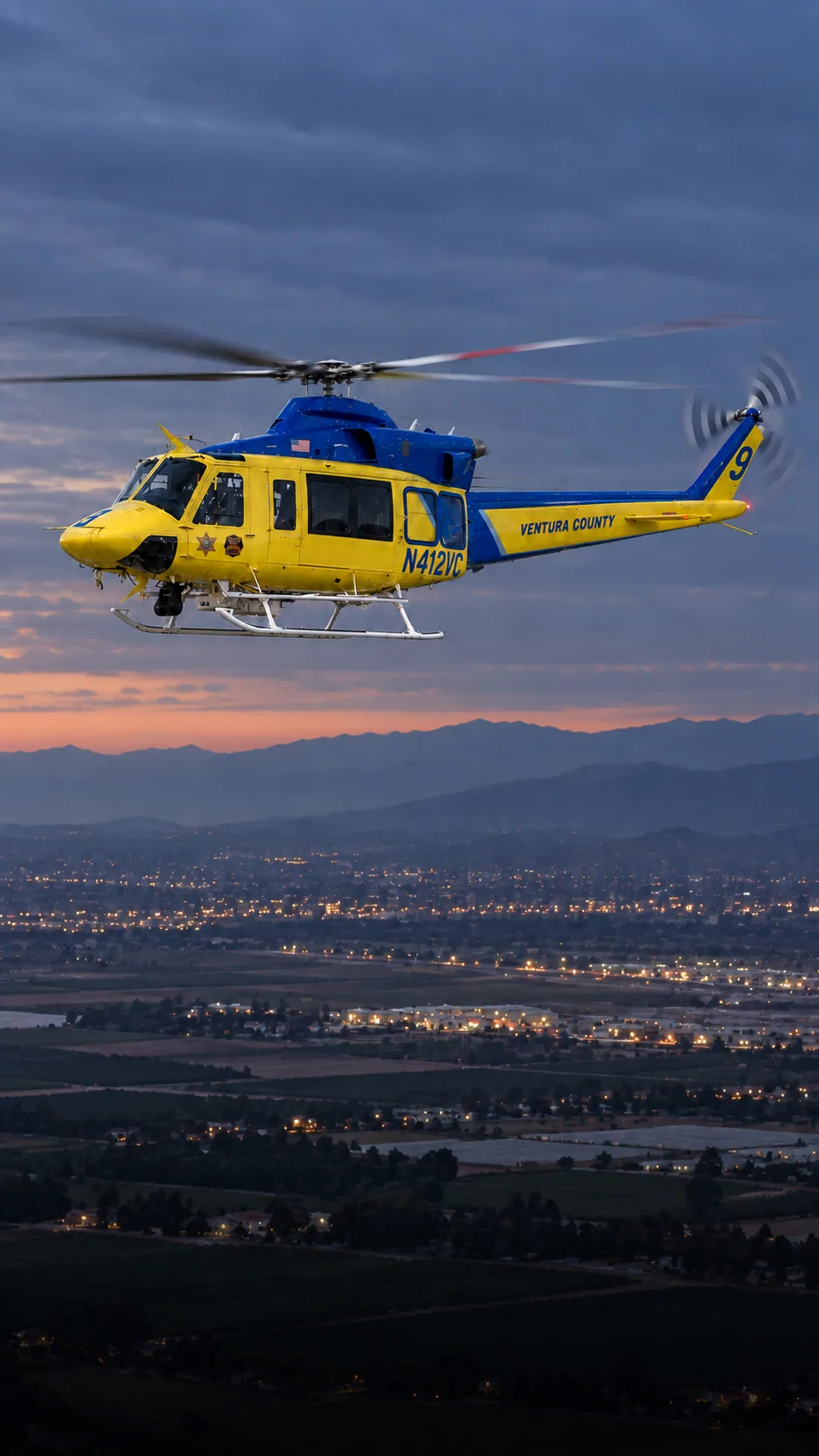 Illustration of N412VC, a Bell 412EP of the Ventura County Sheriff — the foreground helicopter ONLY — over Camarillo, Ventura County.