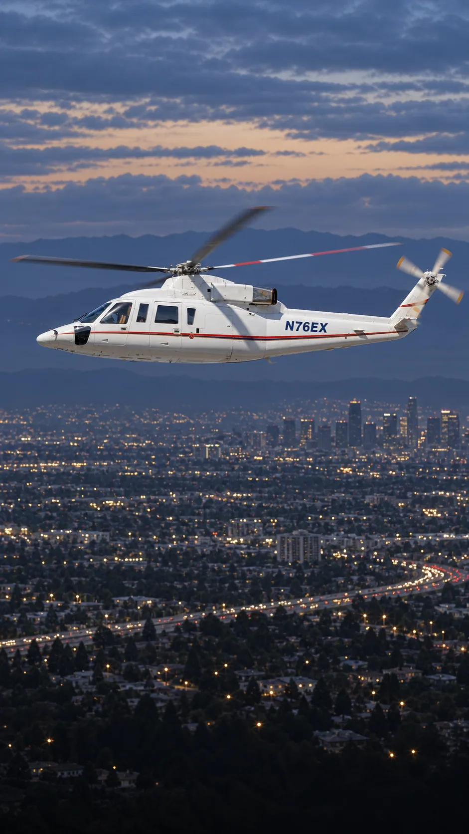 Illustration of N76EX, a white Island Express Sikorsky S-76B with a red stripe, over Los Angeles at dusk.