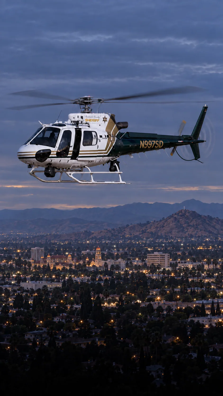 Illustration of N997SD, an Airbus AS350 B3 of the Riverside County Sheriff — riverside County Sheriff — over Riverside, Riverside County.